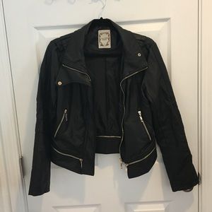 Faux leather jacket with gold zippers